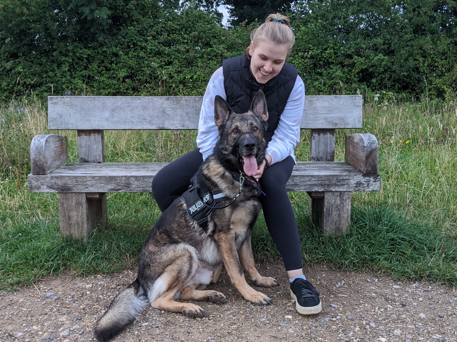 Retired prison dog Jax with owner, Hannah