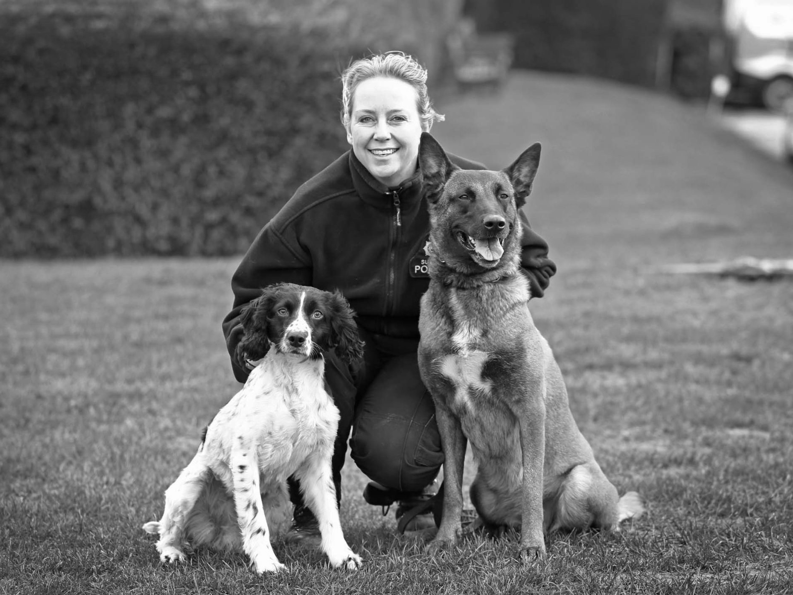 Claire with retired police dogs Sox and Fiji