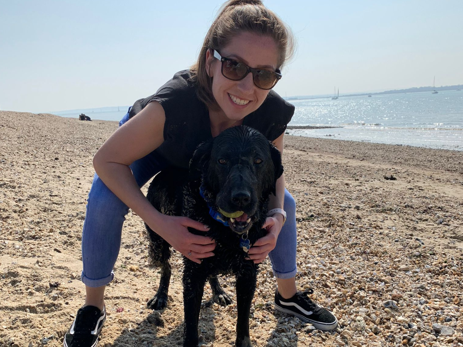Retired police dog Ted with Sophie at the beach