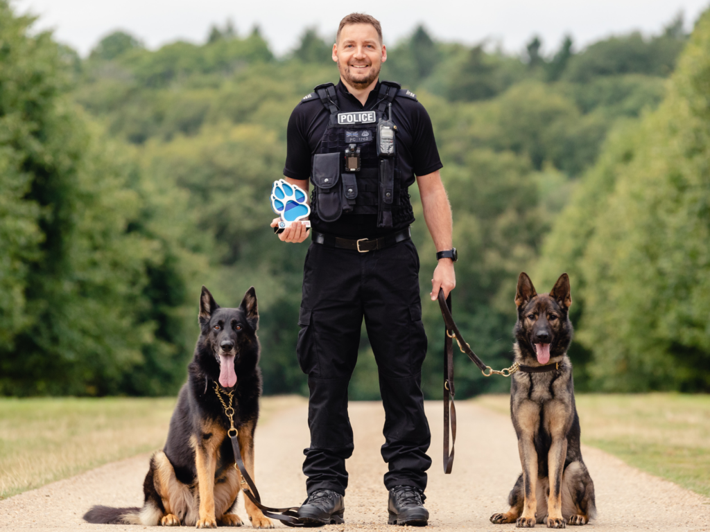 Police dogs Gilly and Jura with Darren