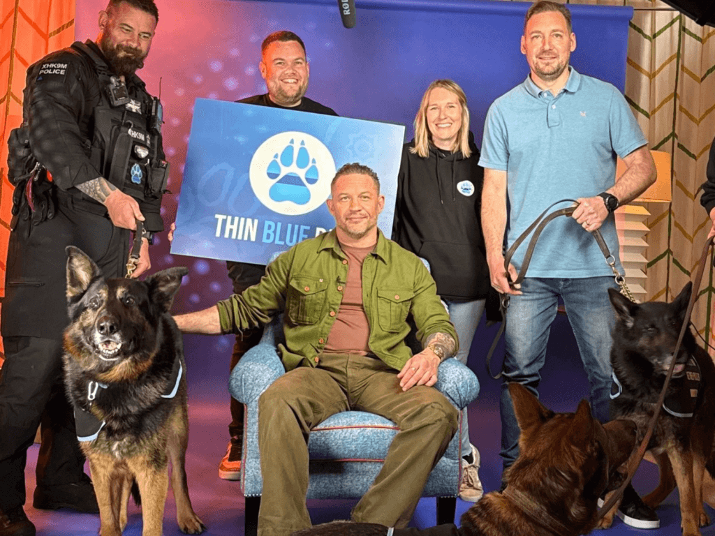 Our team and RPDs Neo, Bear and Gilly with Tom Hardy