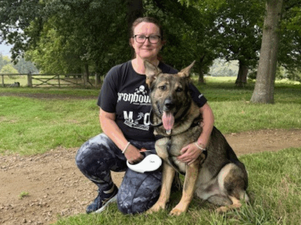 Kirsty and retired police dog Wilson out on a walk