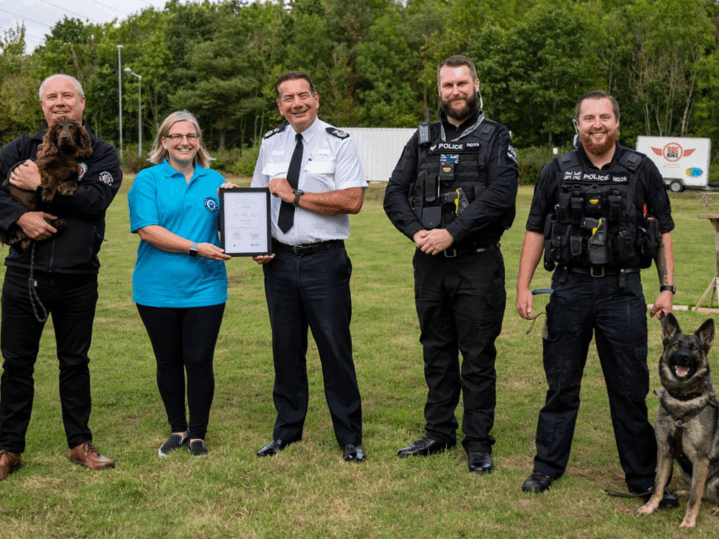 Northamptonshire Police representatives present a cheque to the Foundation after raising money by selling a calendar