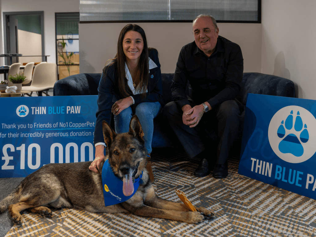 No 1 CopperPot representatives present a £10,000 cheque to the Thin Blue Paw Foundation