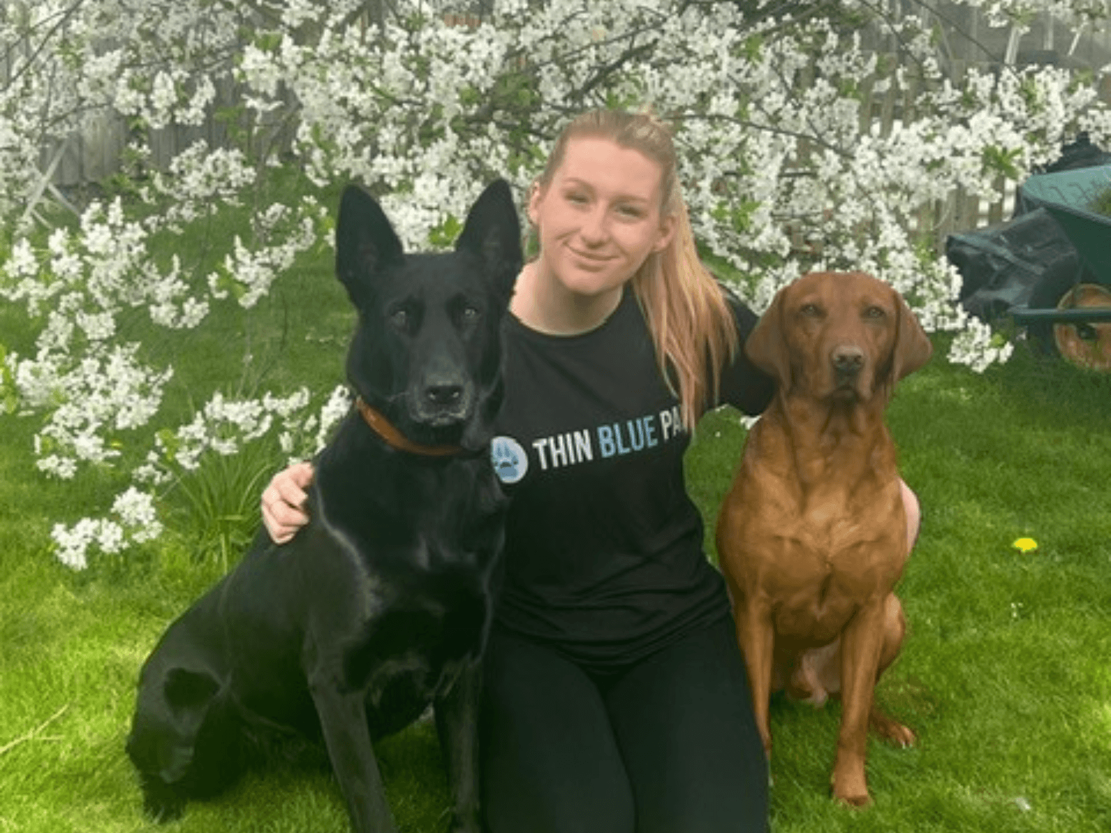 Kirsten with her former police dogs Molly and Goose