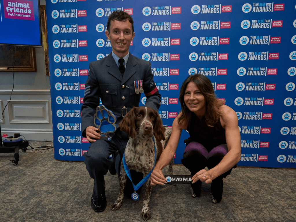 Sgt Craig and MWD Paul collect their award