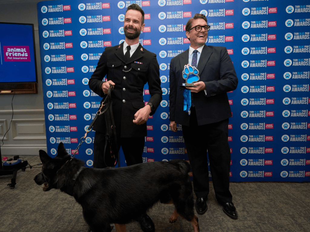 PC Cabrera and PD Frankie collect their Outstanding Bravery Award from Animal Friends Insurance